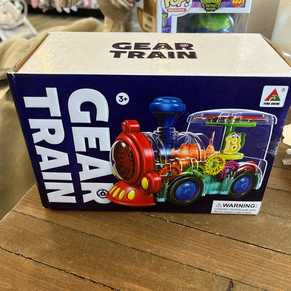 Berry President Transparent Electric Gear Train Toy with Flashing Lights
